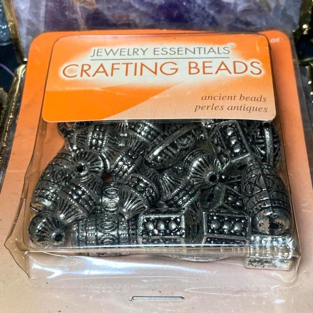 Silver antique beads with intricate designs